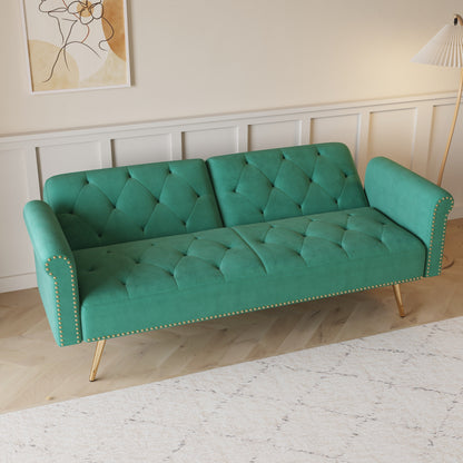 Canapé-lit en velours avec garniture cloutée et coussin décoratif
