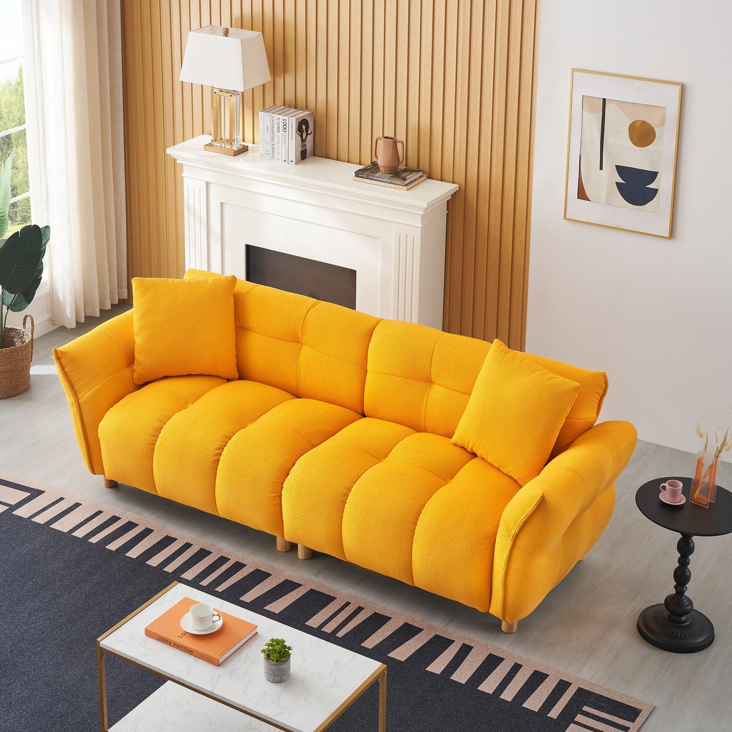 Canapé Teddy de 240 cm de long, avec deux coussins assortis et trois sièges spacieux et confortables.