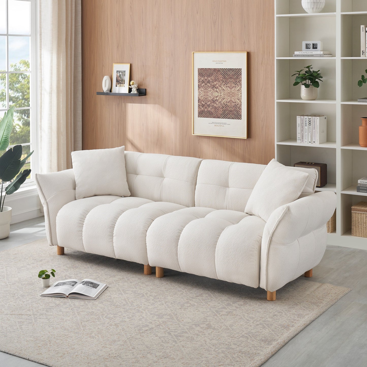Canapé Teddy de 240 cm de long, avec deux coussins assortis et trois sièges spacieux et confortables.