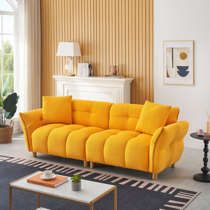 Canapé Teddy de 240 cm de long, avec deux coussins assortis et trois sièges spacieux et confortables.