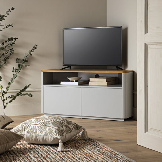 Meuble TV d'angle à bords incurvés Agnes, gris tourterelle avec plateau en chêne
