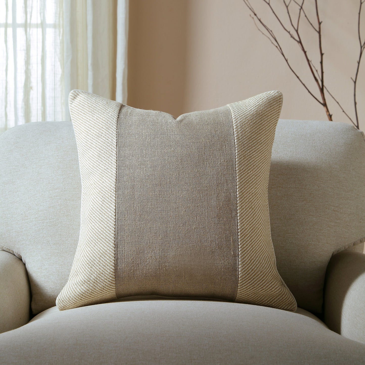 Coussin patchwork en coton de la collection Bronte