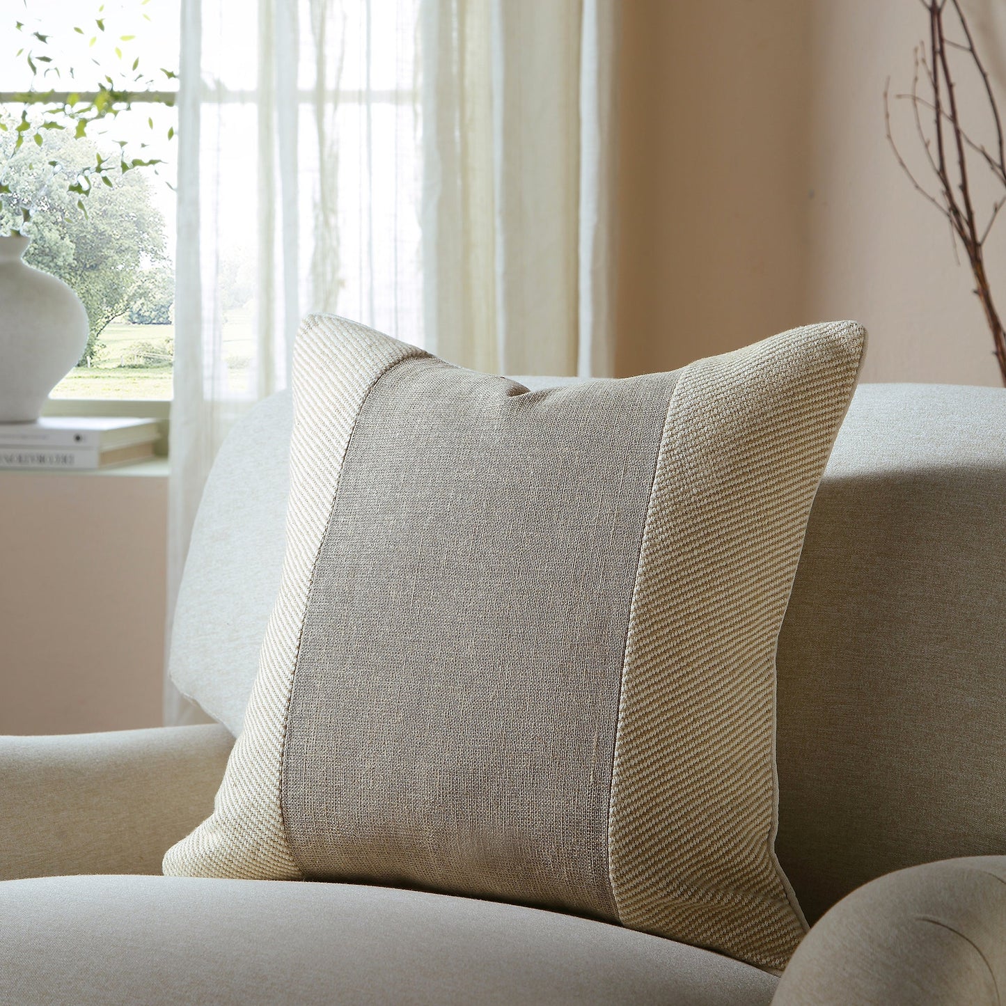 Coussin patchwork en coton de la collection Bronte