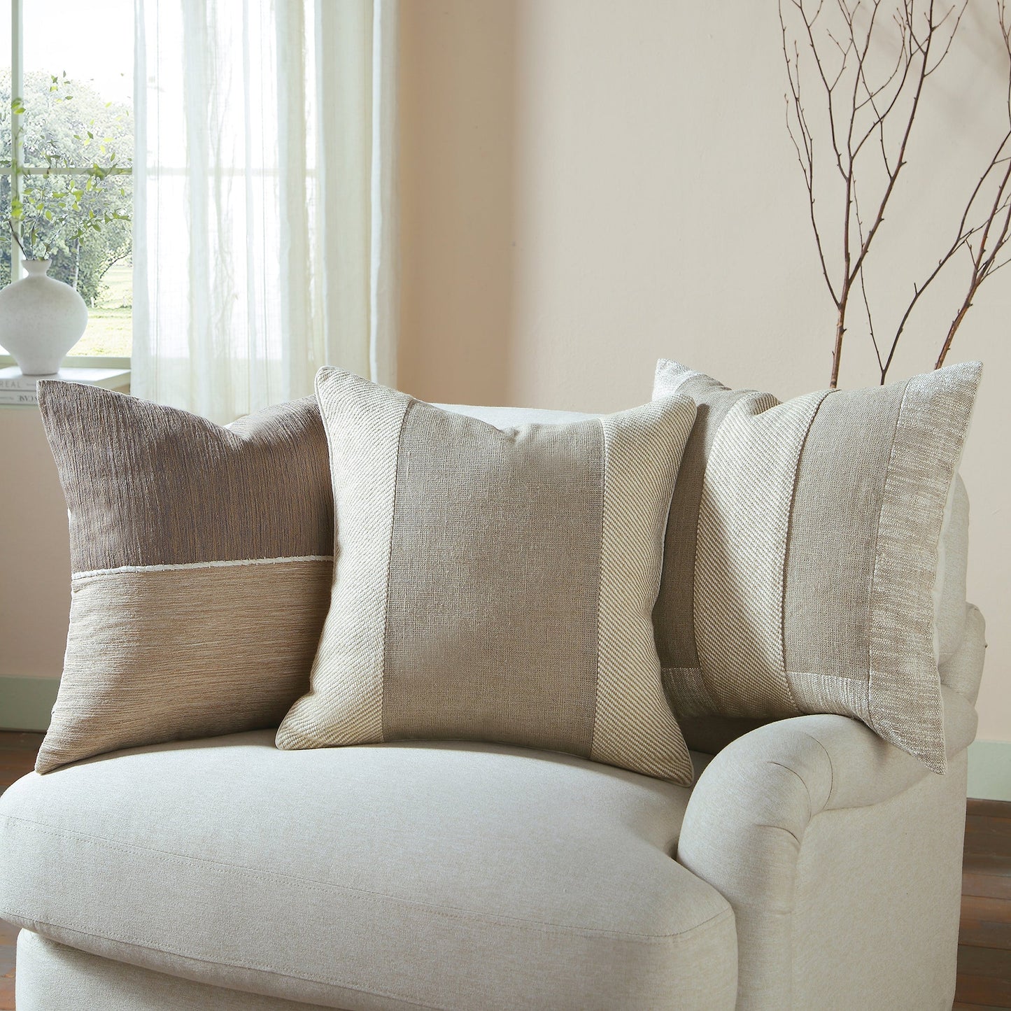 Coussin patchwork en coton de la collection Bronte