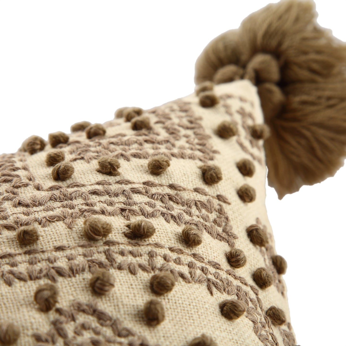 Coussin à pompons style nœud français Savannah de la collection Boho