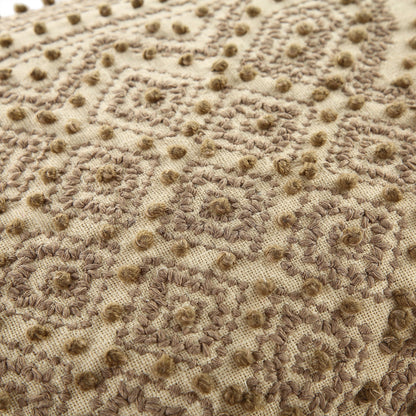 Coussin à pompons style nœud français Savannah de la collection Boho