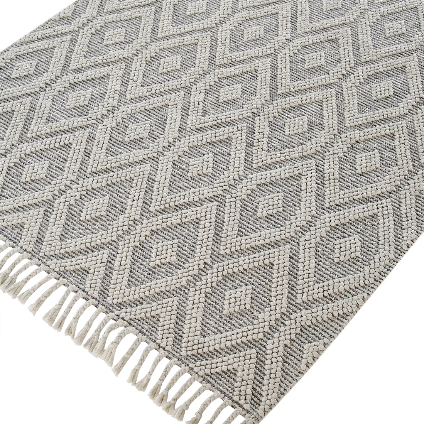 Tapis en laine tissé à la main Avanti gris clair et crème à pompons en losanges