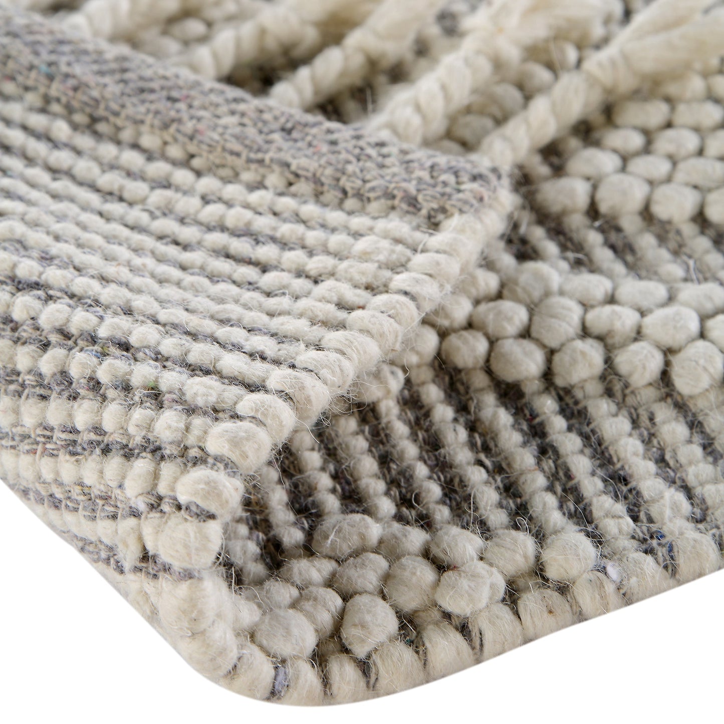 Tapis en laine tissé à la main Avanti gris clair et crème à pompons en losanges