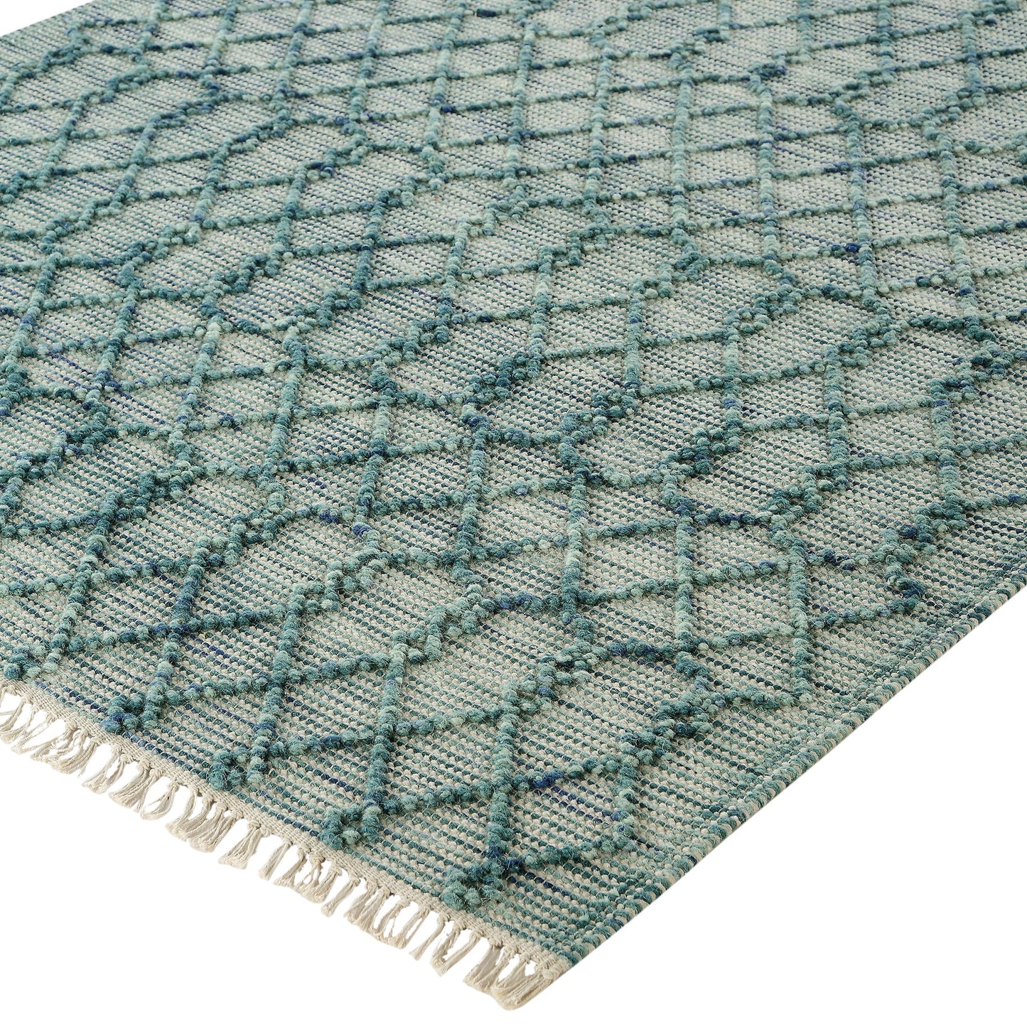 Tapis en laine à pompons aigue-marine tissé à la main Avanti