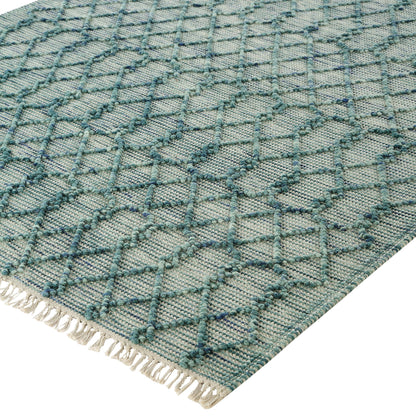 Tapis en laine à pompons aigue-marine tissé à la main Avanti