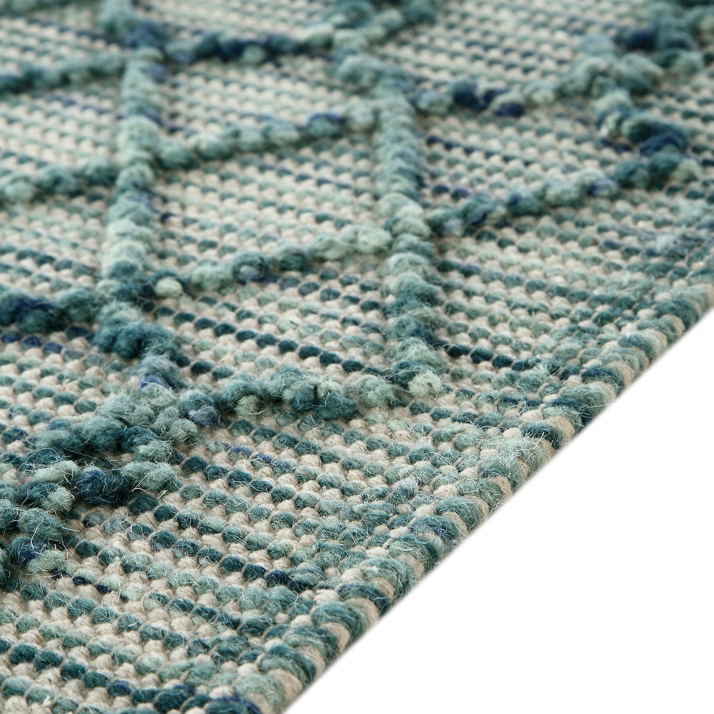 Tapis en laine à pompons aigue-marine tissé à la main Avanti