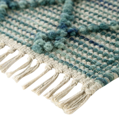 Tapis en laine à pompons aigue-marine tissé à la main Avanti