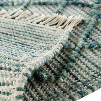 Tapis en laine à pompons aigue-marine tissé à la main Avanti