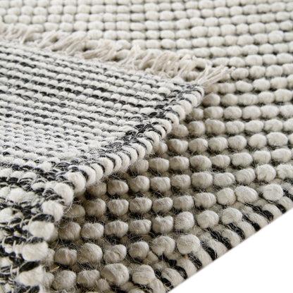 Tapis en laine à pompons diamantés sel et poivre tissé à la main Avanti