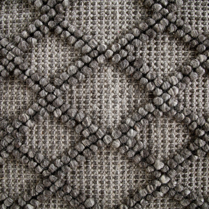Tapis en laine tissé à la main Avanti gris chaud à pompons et losanges