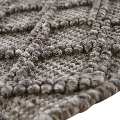 Tapis en laine tissé à la main Avanti gris chaud à pompons et losanges
