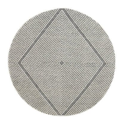 Tapis rond en laine tissé à la main Avanti, motif sel et poivre, à pompons et diamants
