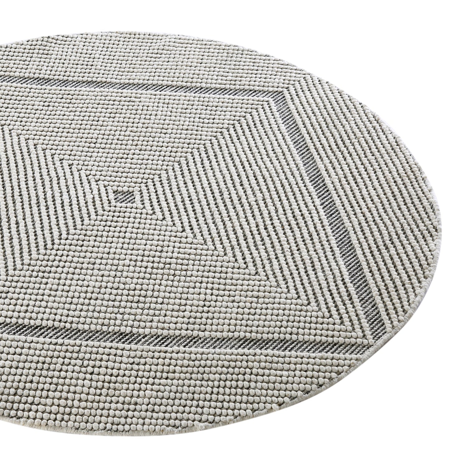 Tapis rond en laine tissé à la main Avanti, motif sel et poivre, à pompons et diamants