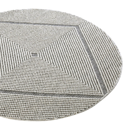 Tapis rond en laine tissé à la main Avanti, motif sel et poivre, à pompons et diamants