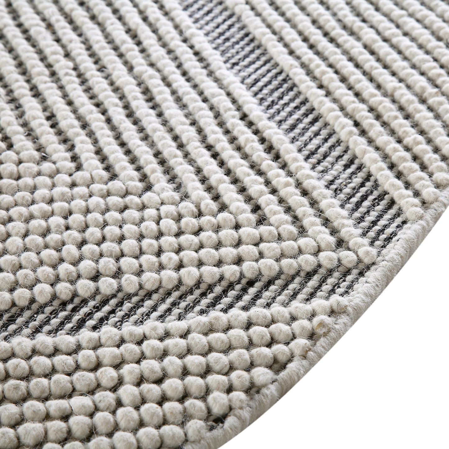 Tapis rond en laine tissé à la main Avanti, motif sel et poivre, à pompons et diamants