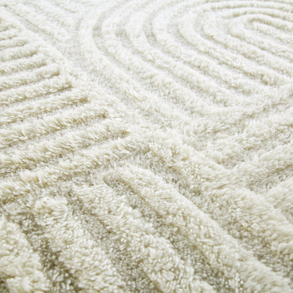 Tapis rond en laine de Nouvelle-Zélande touffeté à la main Geo Curve couleur crème