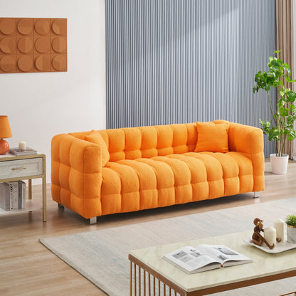 Canapé 3 places Teddy Orange 80 avec deux coussins et pieds en matériel robuste