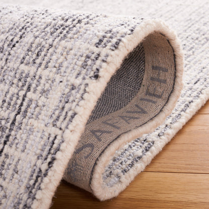 Tapis moderne en laine abstrait Maggy fait main SAFAVIEH