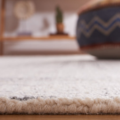 Tapis moderne en laine abstrait Maggy fait main SAFAVIEH