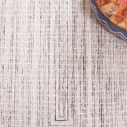 Tapis moderne en laine abstrait Maggy fait main SAFAVIEH