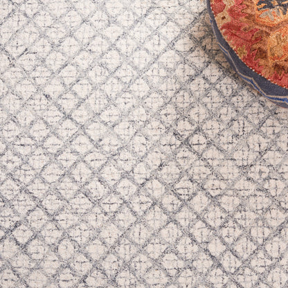 Tapis moderne en laine abstrait fait main SAFAVIEH Suhad