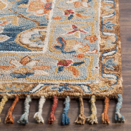 Tapis en laine à pompons Aspen Kimm Boho fait main SAFAVIEH