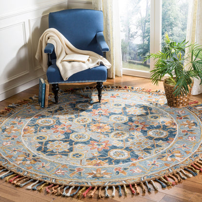 Tapis en laine à pompons Aspen Kimm Boho fait main SAFAVIEH