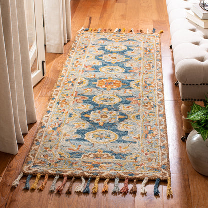 Tapis en laine à pompons Aspen Kimm Boho fait main SAFAVIEH