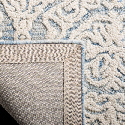 Tapis en laine moderne à motif floral SAFAVIEH fait main Blossom Cateluta