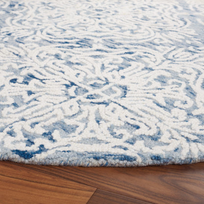 Tapis en laine moderne à motif floral Gertrida fait main SAFAVIEH