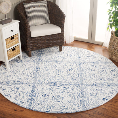 Tapis en laine moderne à motif floral Gertrida fait main SAFAVIEH