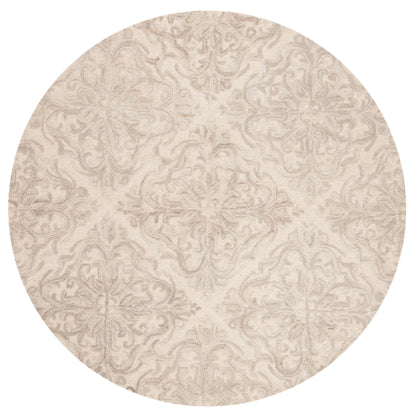 Tapis en laine moderne à motif floral Gertrida fait main SAFAVIEH