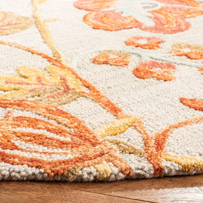 Tapis en laine moderne à motif floral SAFAVIEH fait main Blossom Hysnije