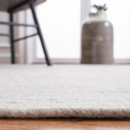 Tapis de campagne tressé à la main SAFAVIEH en laine