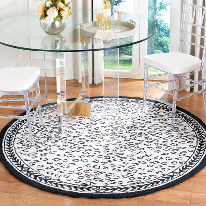 Tapis SAFAVIEH fait main Chelsea Solar Garden Leopard en laine de campagne française