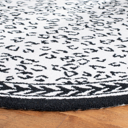 Tapis SAFAVIEH fait main Chelsea Solar Garden Leopard en laine de campagne française