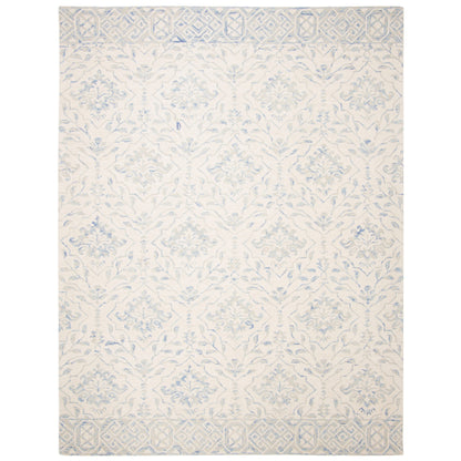 Tapis en laine Elvedina à motif floral, teint à la main par SAFAVIEH