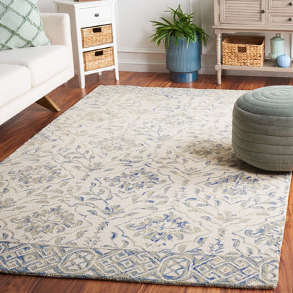 Tapis en laine Elvedina à motif floral, teint à la main par SAFAVIEH