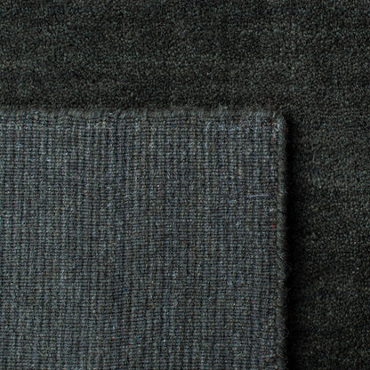 Tapis moderne en laine SAFAVIEH fait main, bordure en palmier de l'Himalaya