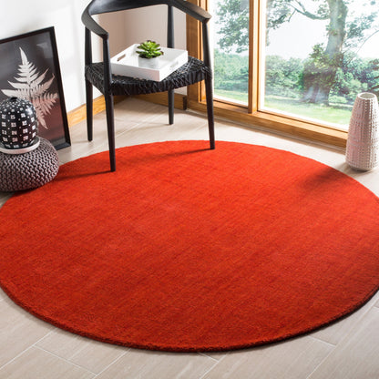 Tapis moderne en laine SAFAVIEH fait main, bordure en palmier de l'Himalaya