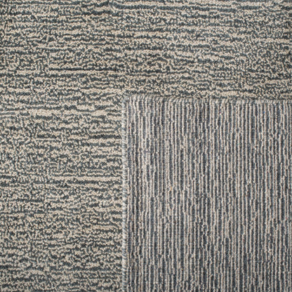 Tapis moderne en laine SAFAVIEH fait main, bordure en palmier de l'Himalaya