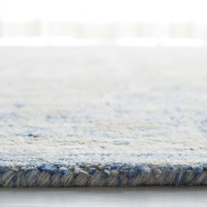 Tapis en laine SAFAVIEH à micro-boucles, motif médaillon Gulseven, fait main