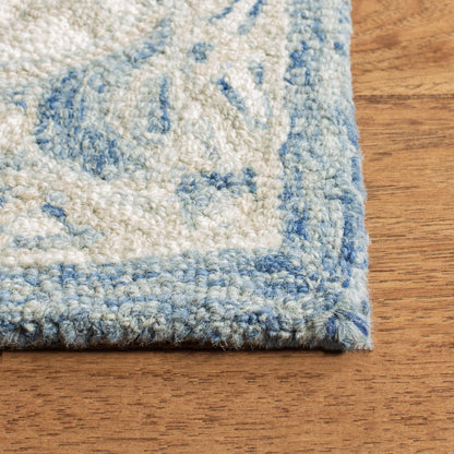 Tapis en laine SAFAVIEH à micro-boucles, motif médaillon Gulseven, fait main