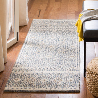 Tapis SAFAVIEH en laine Lutetia micro-bouclée faite à la main