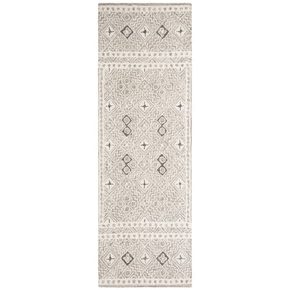 Tapis SAFAVIEH en laine Lutetia micro-bouclée faite à la main